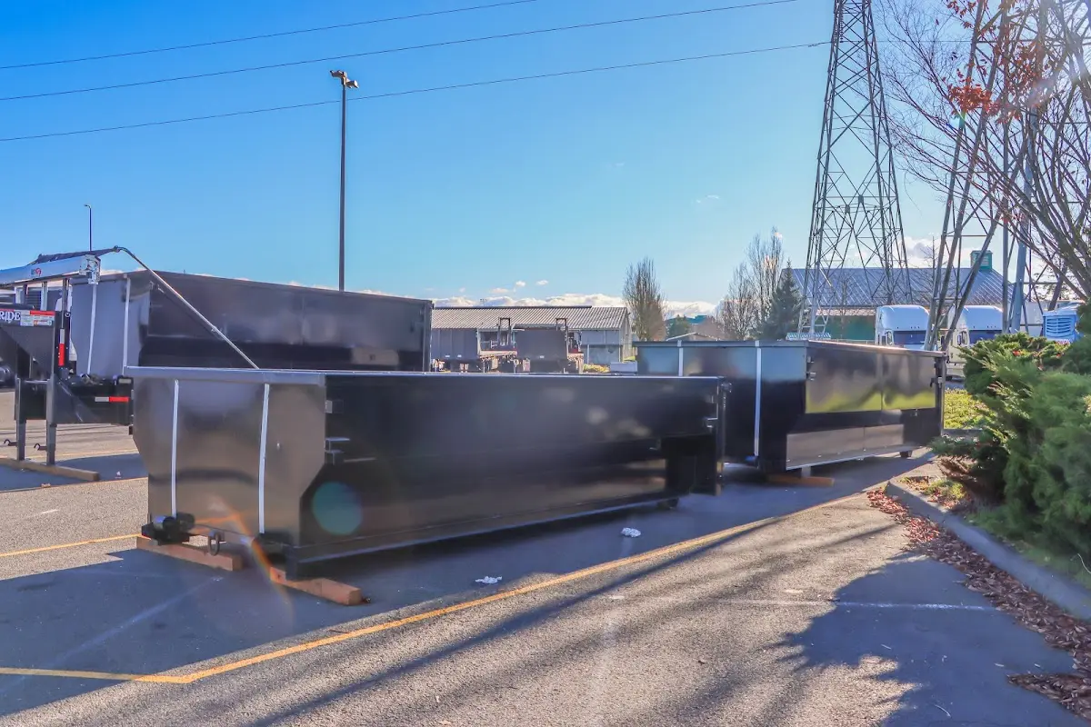 Roll-off dumpster ready for waste disposal at job site for 2 Yard Dumpster Rental in Woodland Park
